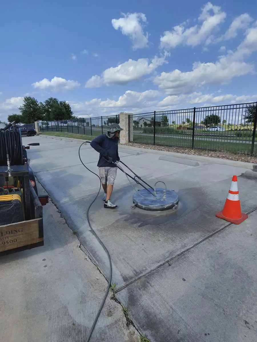 Surface cleaner pressure washing concrete in Houston TX