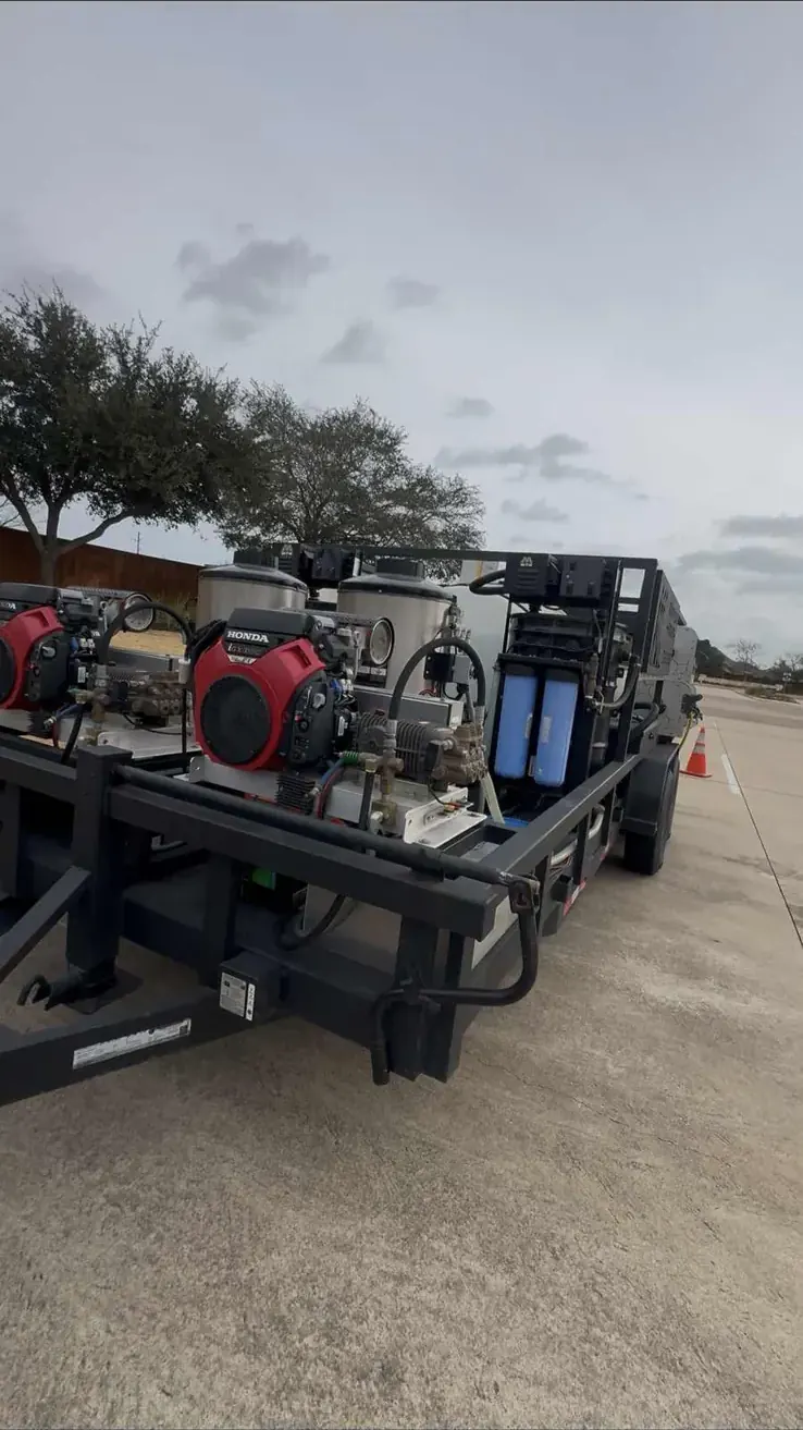 Commercial pressure washing equipment on a large job near Alvin, TX