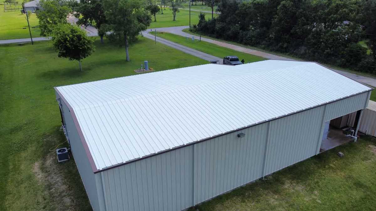 Metal building roof after soft washing in Houston TX
